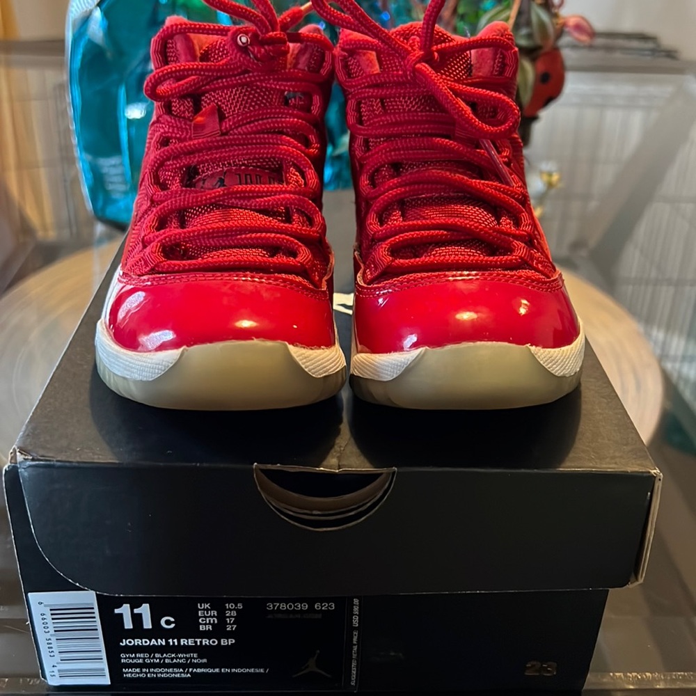 Boys size 11c red in color Jordan’s
